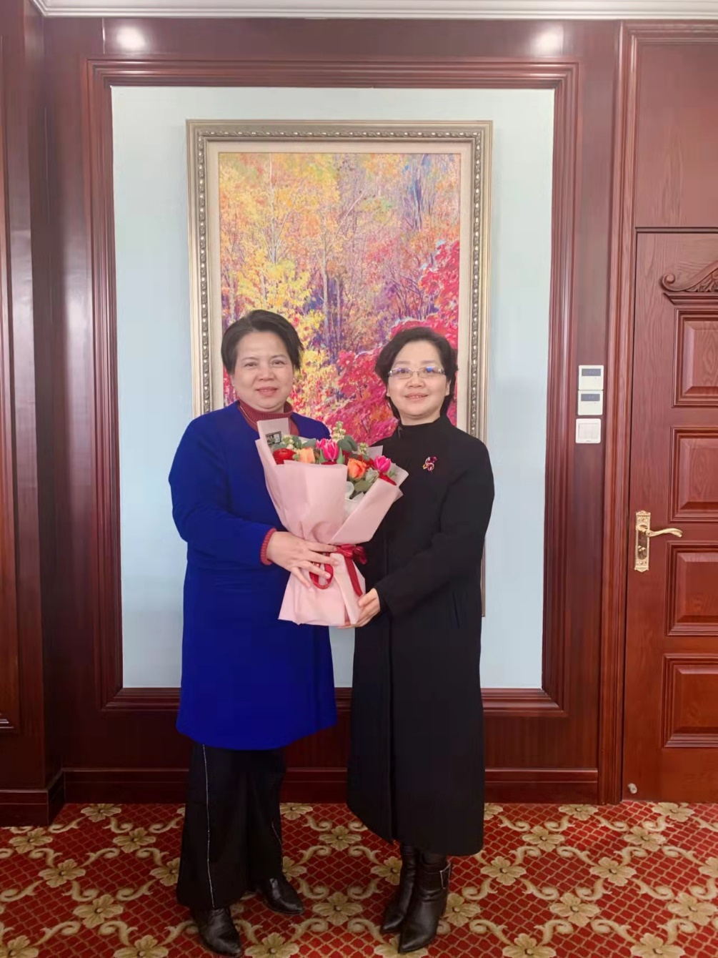 Li Wei, Chairman of Jinshan District Women's Federation, visited our company